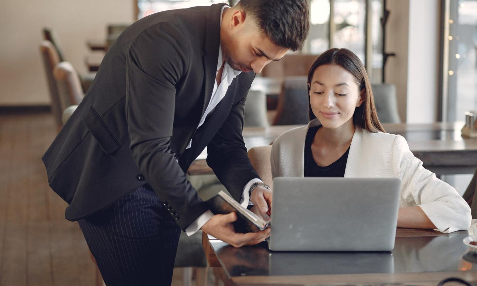 Financial analysis and business planning session with charts and documents